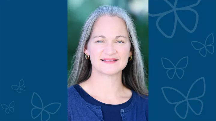Professional headshot of Elizabeth Burgener, MD against blue letterbox background