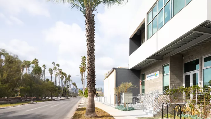 A two-story office building with a banner that reads Children's Hospital Los Angeles