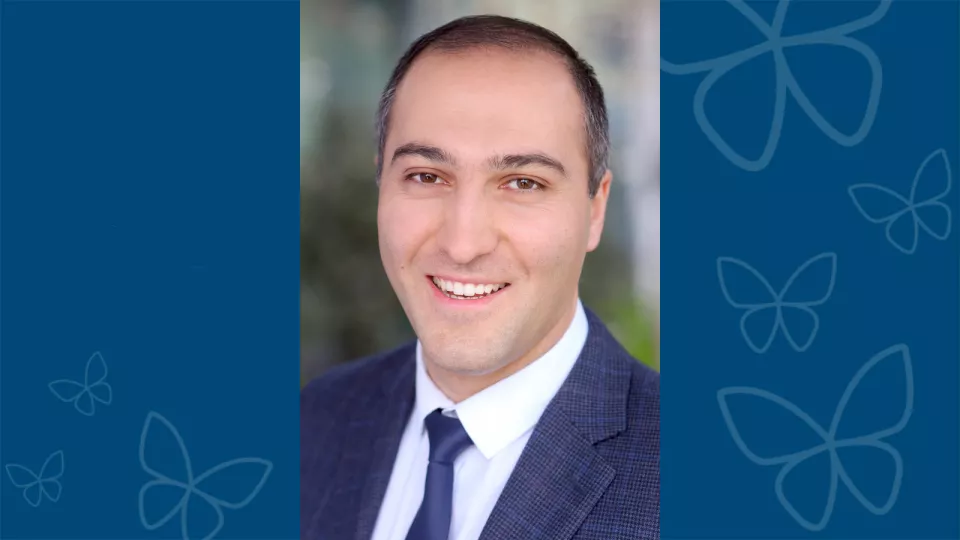 Professional headshot of Sargis Sedrakyan, PhD, against a blue background with CHLA butterfly logo