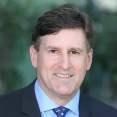 Professional headshot of Robert M. Kay, MD