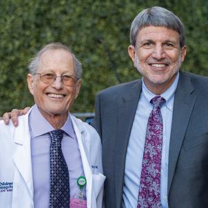 Robert Adler, MD, and Paul S. Viviano