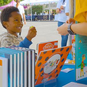 Young boy receives a book