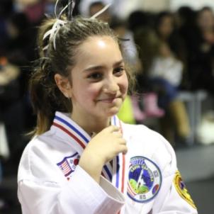 Sydney now as a black belt in taekwondo.