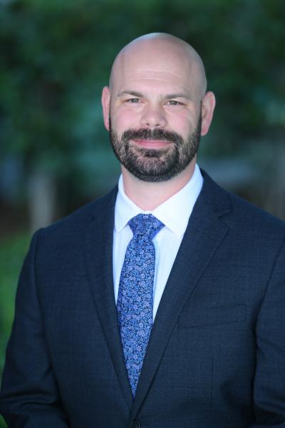 Professional headshot of Jonas Owen, MD