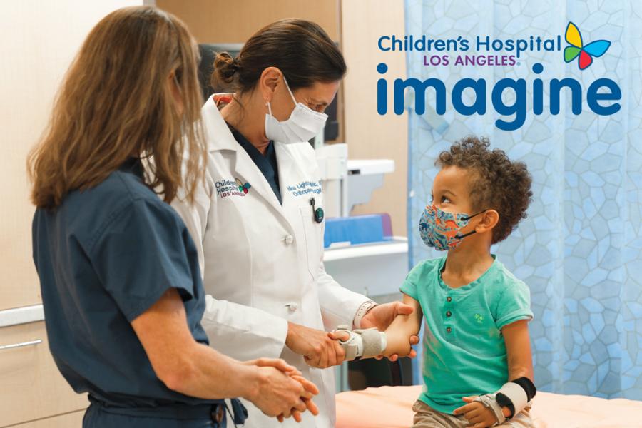 CHLA Imagine Magazine Winter 2022 Cover image showing a physician and a nurse examining a young boy